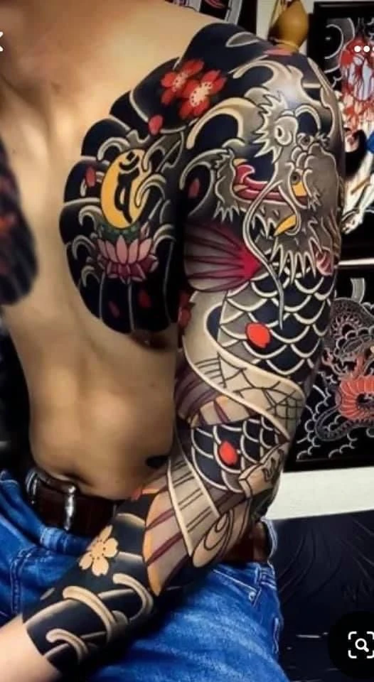 Hình xăm cá chép hóa rồng ở tay mang ý nghĩa gì