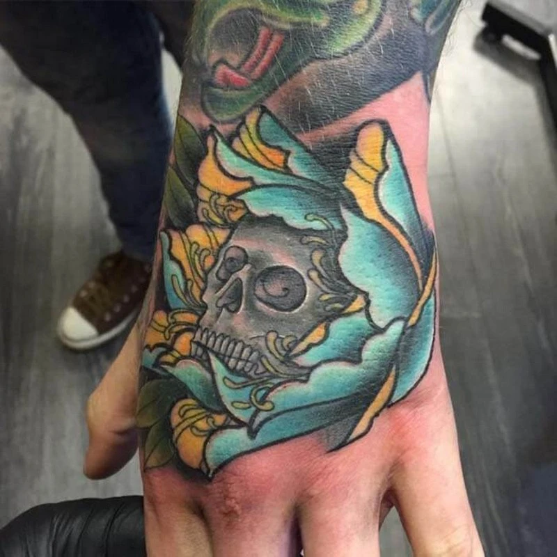 Hình xăm hoa mẫu đơn và ý nghĩa tuyệt vời cho nam nữ